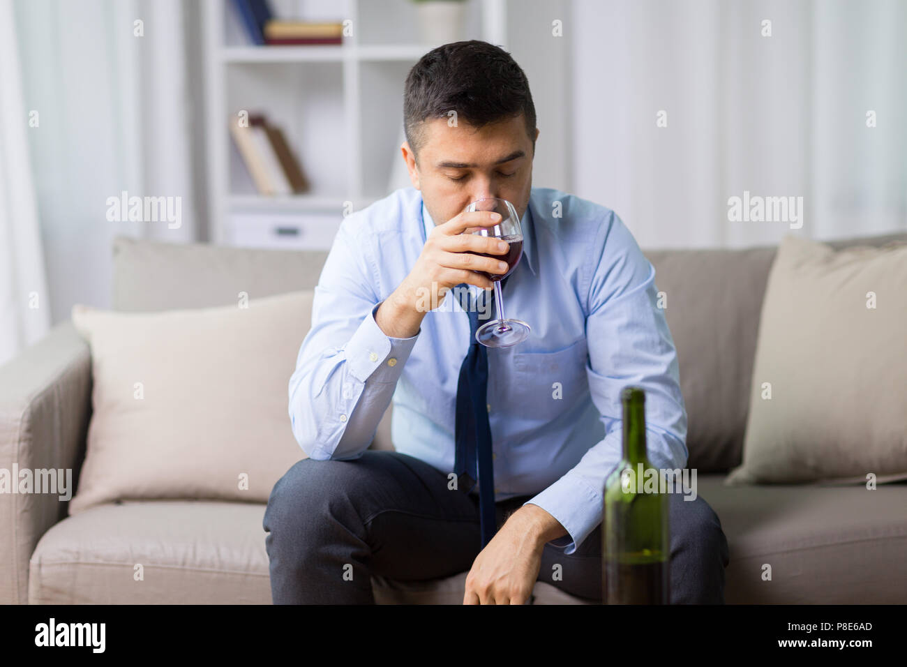 alcoholic drinking red wine at home Stock Photo