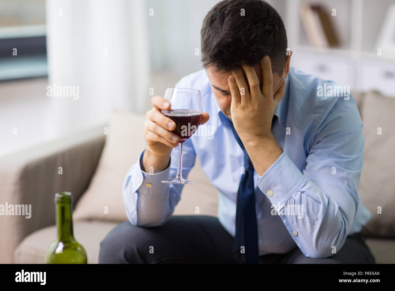 alcoholic drinking red wine at home Stock Photo