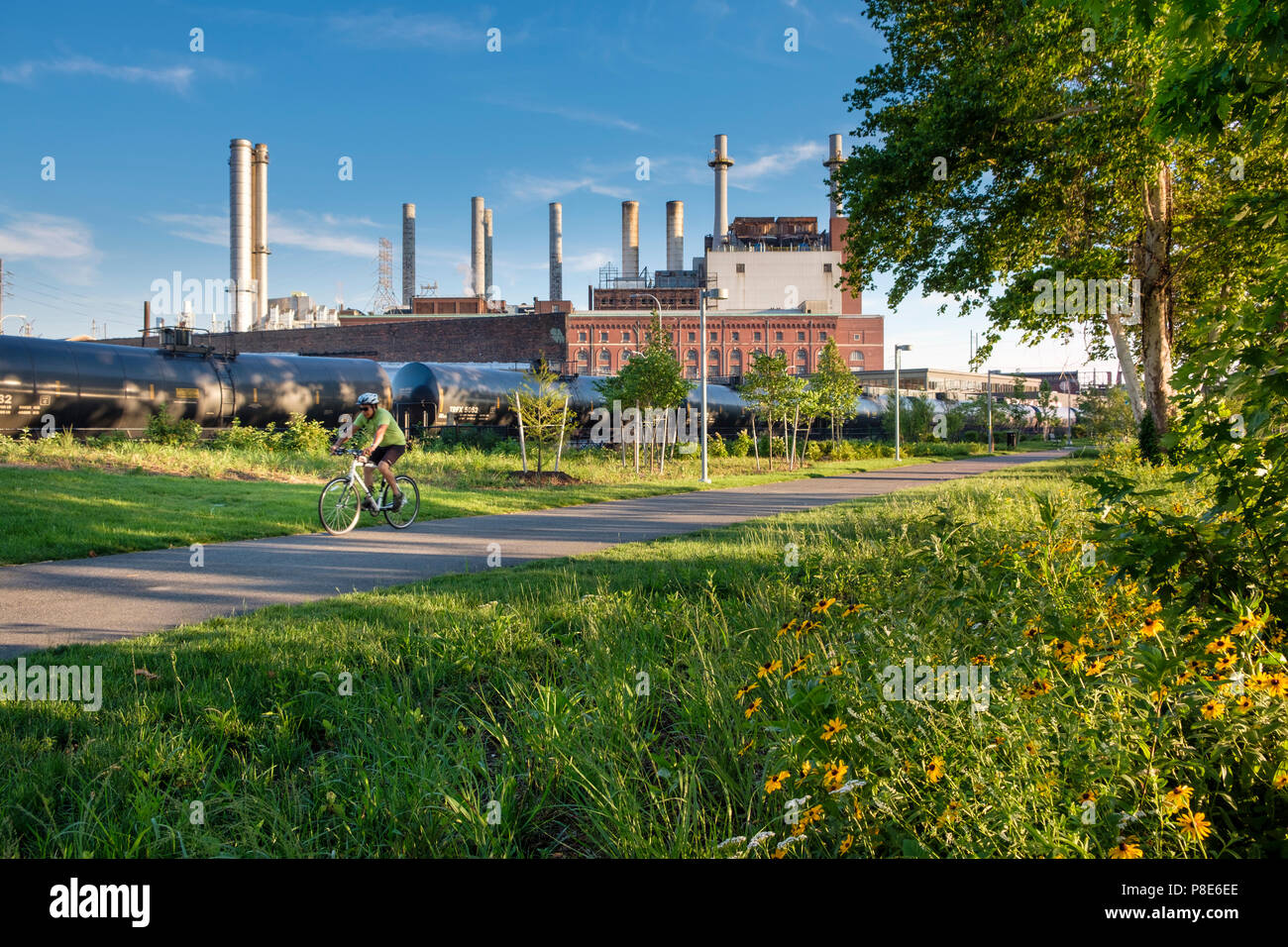 Schuylkill Banks Recreation Path in revitalized industrial area with Veolia Thermal Energy Plant, Philadelphia , Pennsylvania, USA Stock Photo