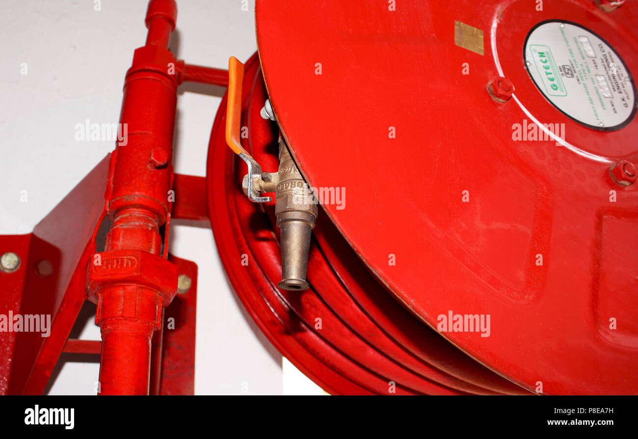 Fire extinguisher and hose reel in building Fire extinguisher and hose