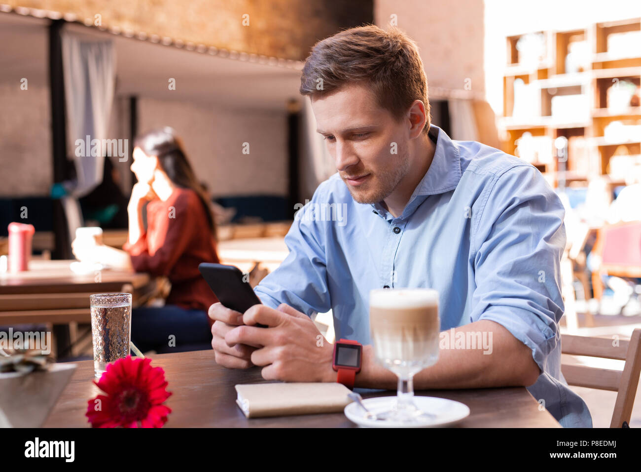 Modern businessman checking his e-mail on smart phone Stock Photo