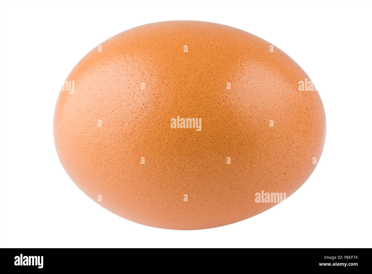 Chicken egg lies on a white background, isolated Stock Photo