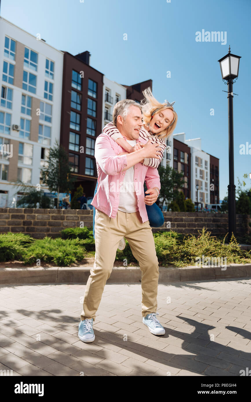 Nice joyful couple having fun Stock Photo