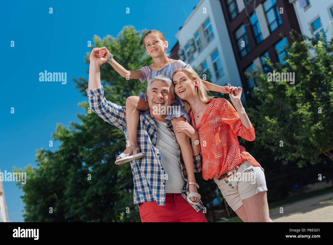 Happy family enjoying house hi-res stock photography and images - Alamy