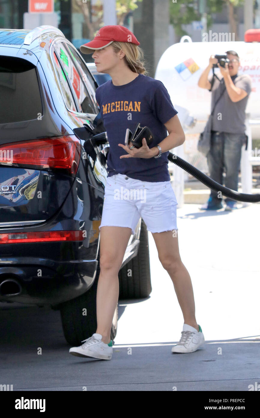 Selma Blair pumping gas at a gas station in the Studio City