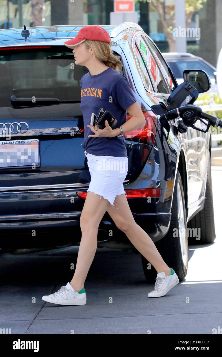 Selma Blair pumping gas at a gas station in the Studio City
