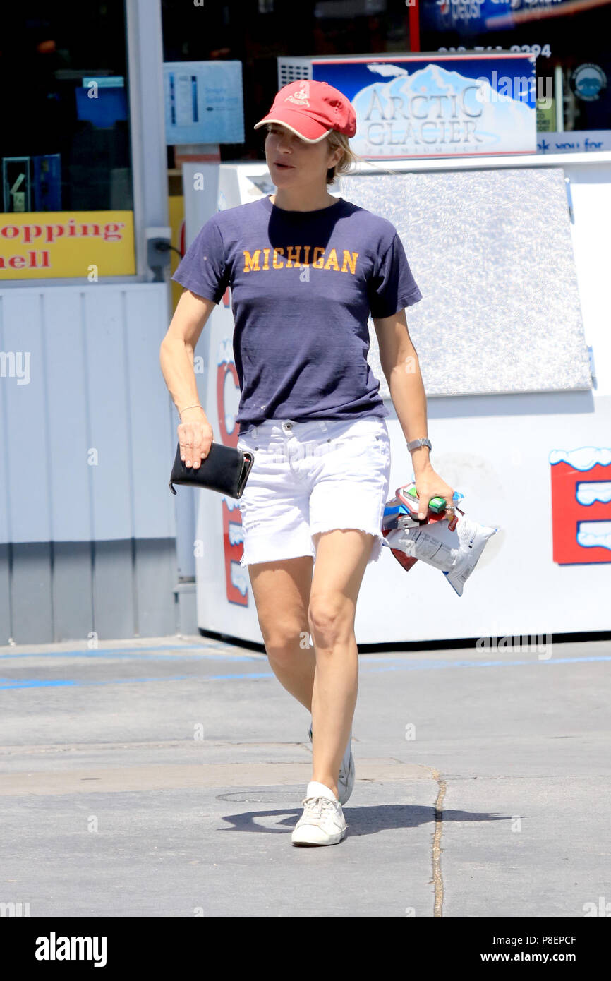 Selma Blair pumping gas at a gas station in the Studio City