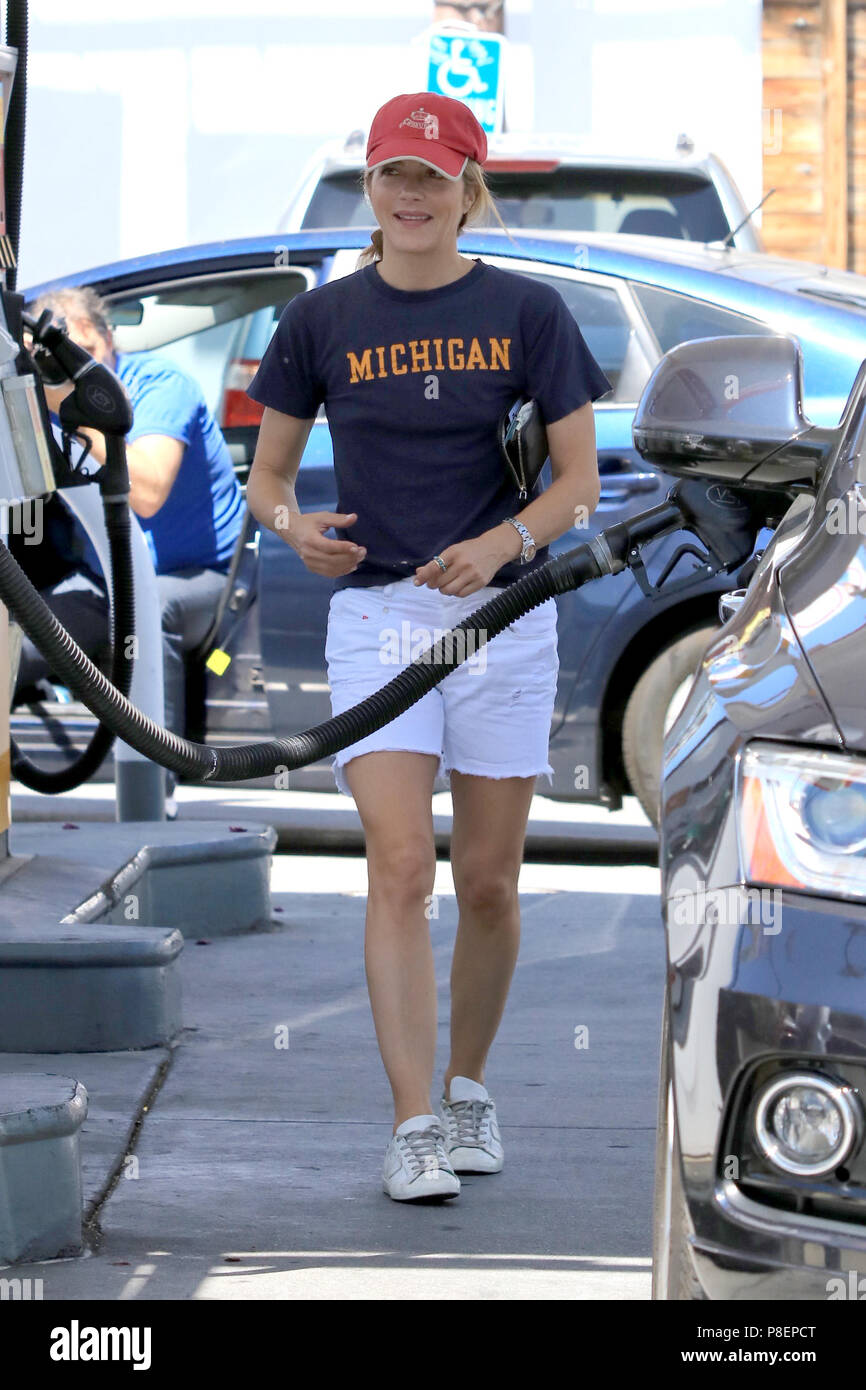 Selma Blair pumping gas at a gas station in the Studio City