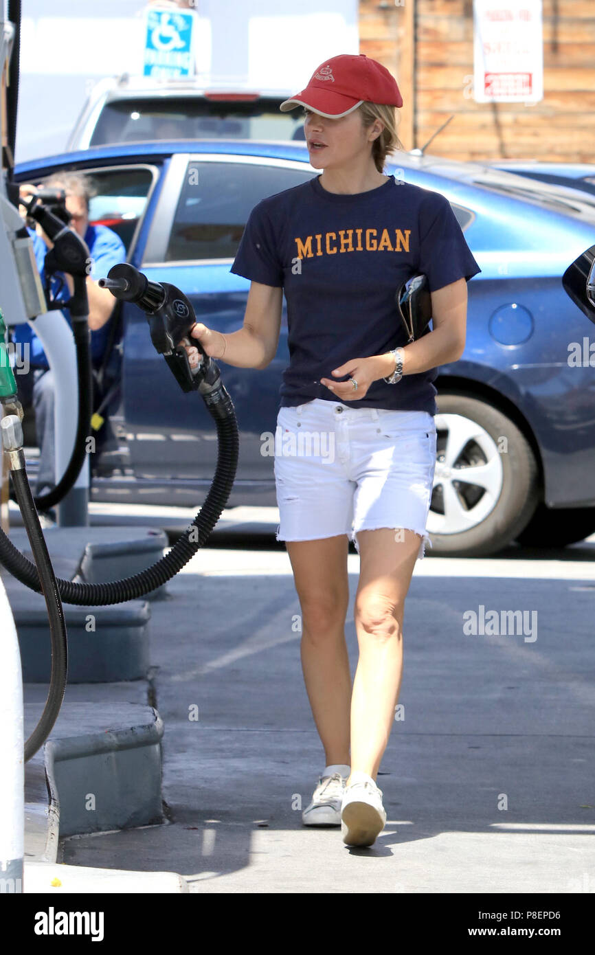 Selma Blair pumping gas at a gas station in the Studio City