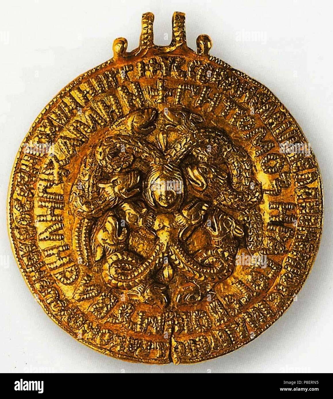 Amulet 'Chernihiv Grivna' of Prince Vladimir II Monomakh (Obverse: Archangel Michael. Reverse: Gorgon). Museum: State Russian Museum, St. Petersburg. Stock Photo