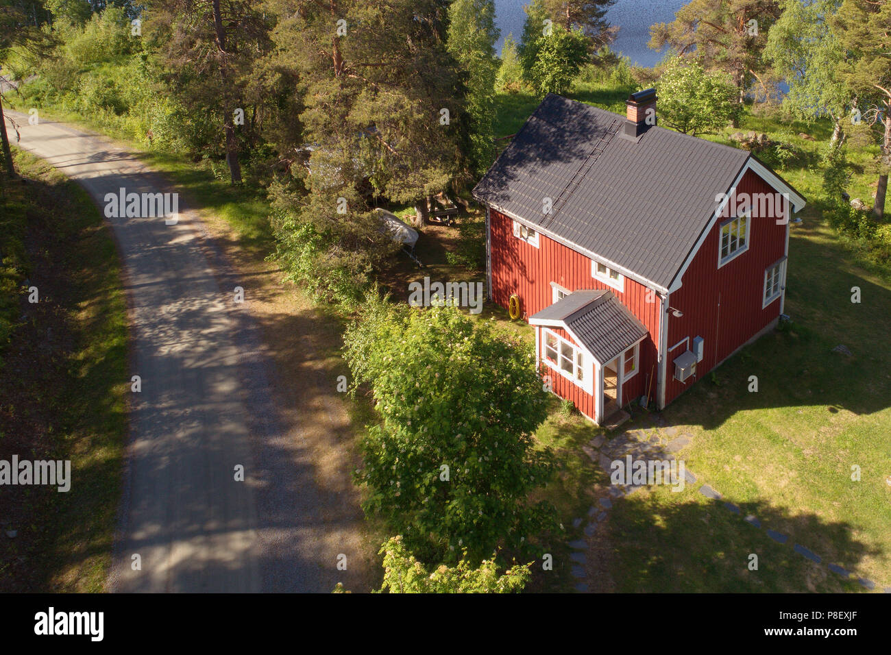 Ranea, Sweden - June 17, 2018: Aerial view of a red two stories one family residential wooden house constructed during the 1930s. Stock Photo