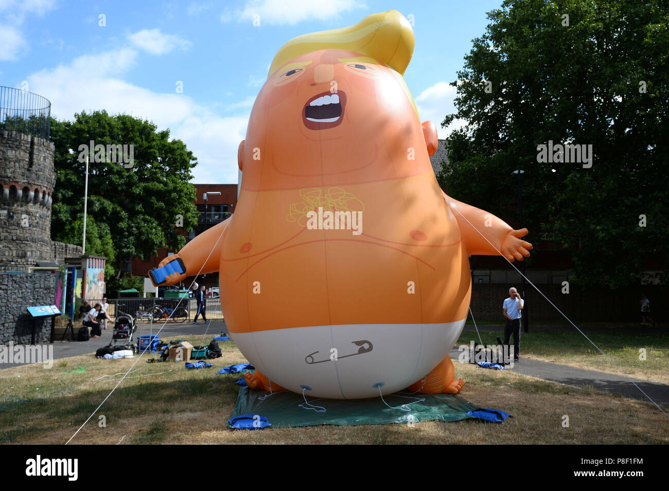 The Trump Baby Blimp is inflated during a practice test, at Bingfield Park in north London. Stock Photo