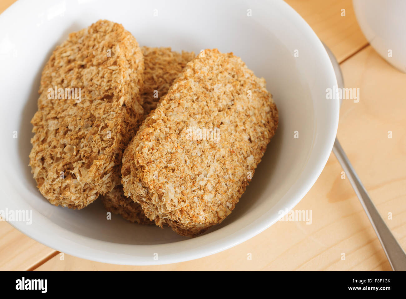 Healthy wholewheat breakfast cereal biscuits Stock Photo Alamy