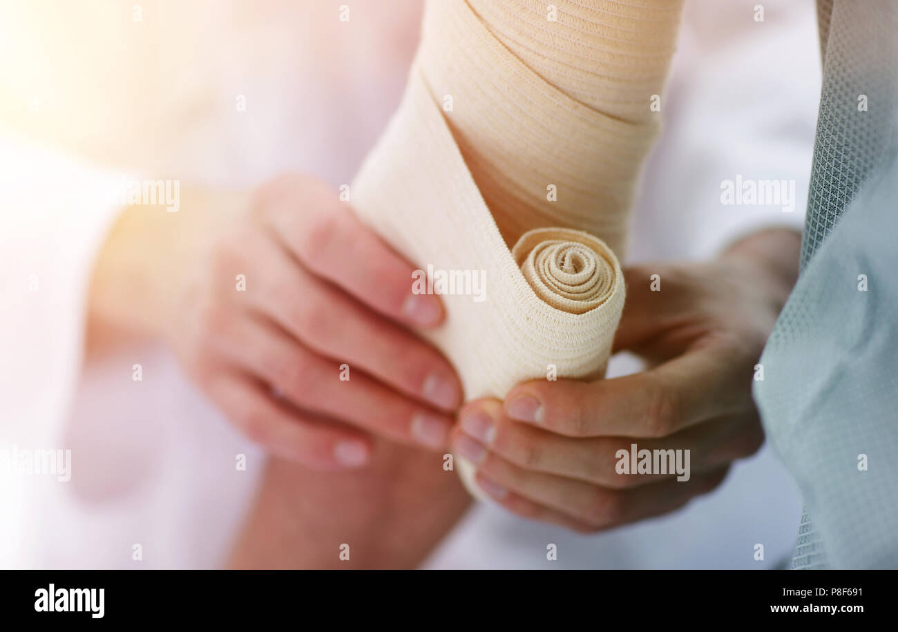 closeup.doctor applying elastic bandage Stock Photo Alamy