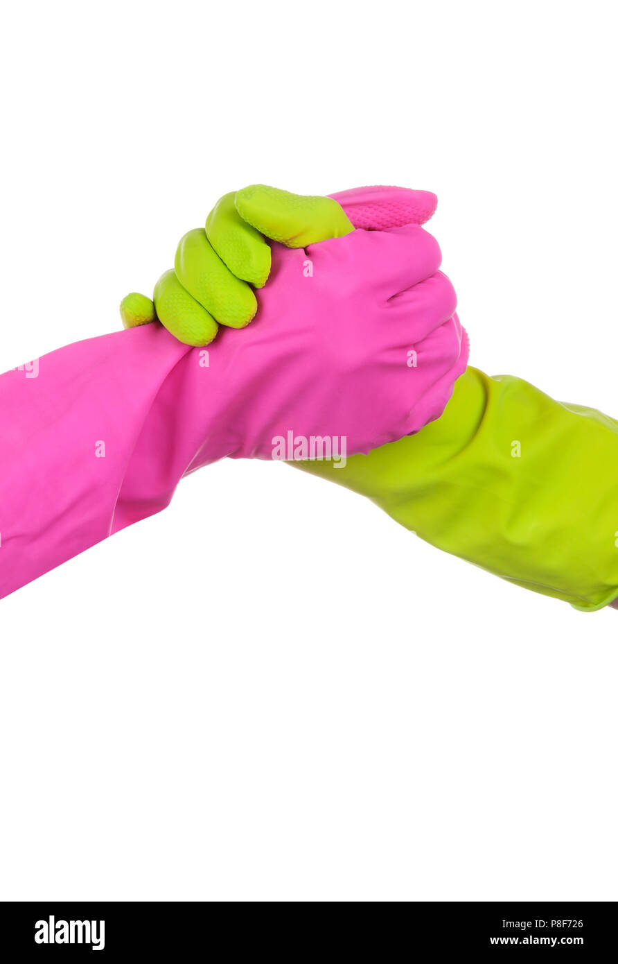 Handshake in colorful cleaning gloves isolated on white background. Cooperation, good job, facility management concept. Stock Photo