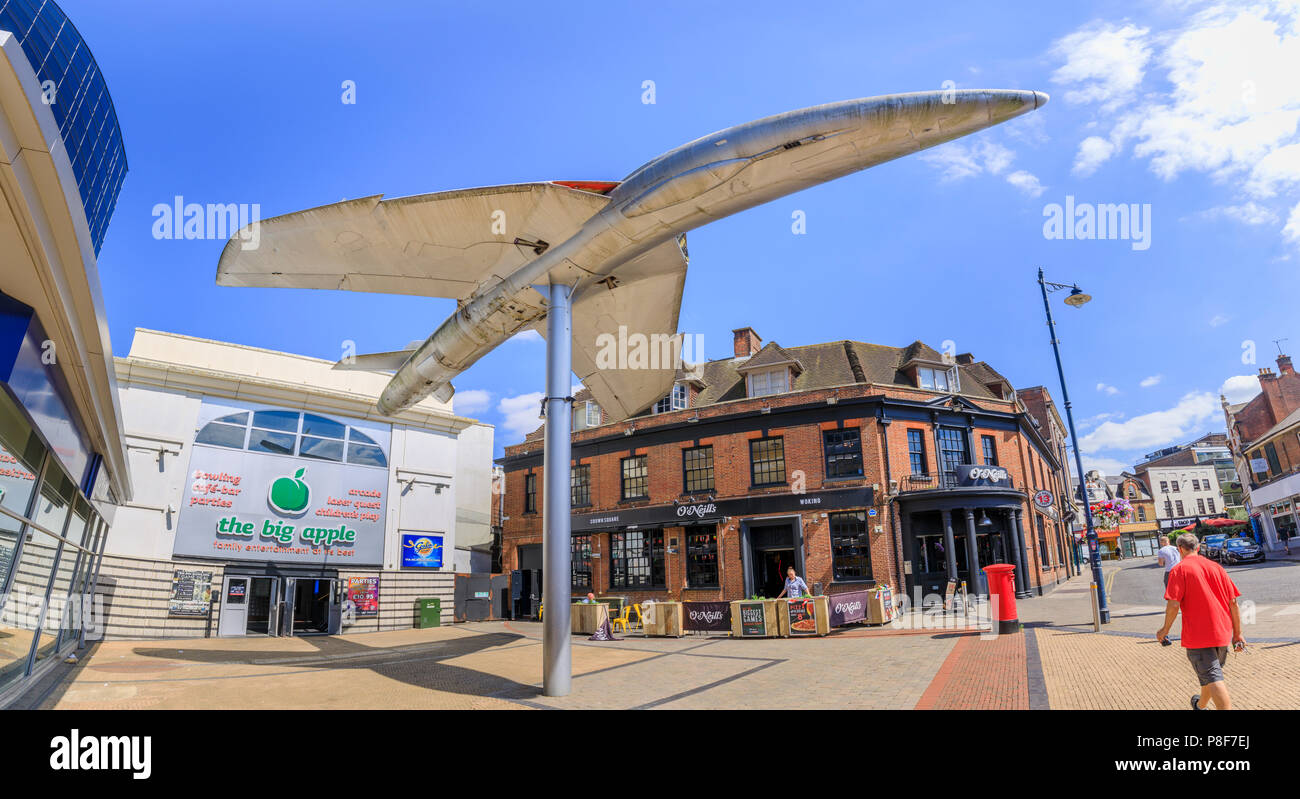 Hawker Hunter aircraft mounted on a pole outside the Big Apple entertainment centre in Crown Square, Woking town centre, Surrey, UK Stock Photo