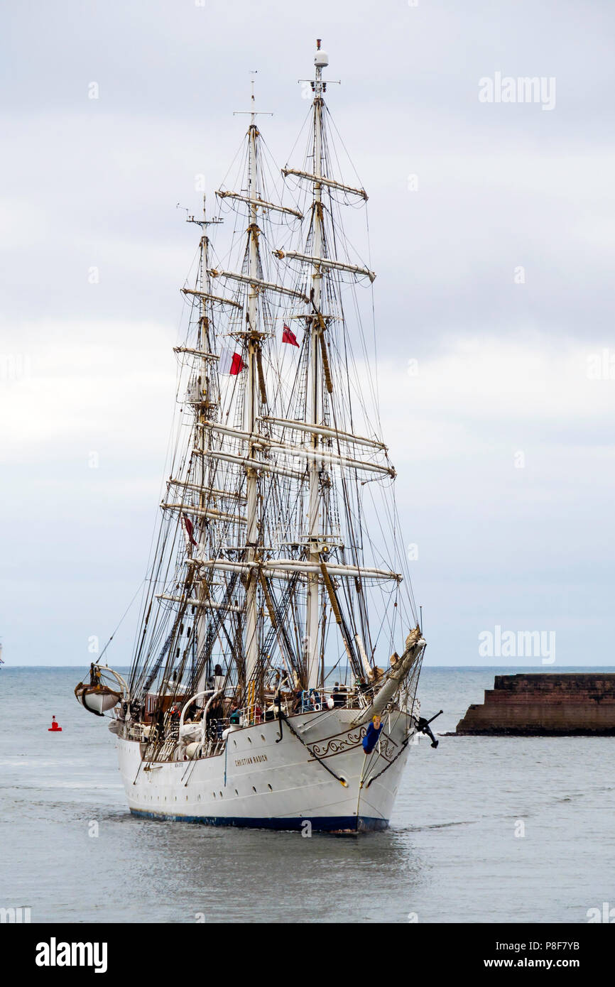 The Norwegian Full rigged three masted sail training ship Christian Radich arriving in Roker Harboir Sunderland for the Tall Ships Race 2018 Stock Photo