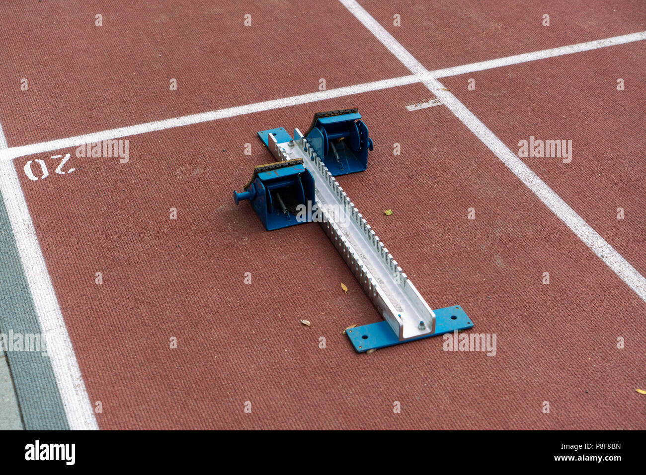 Starting block on running track Stock Photo Alamy
