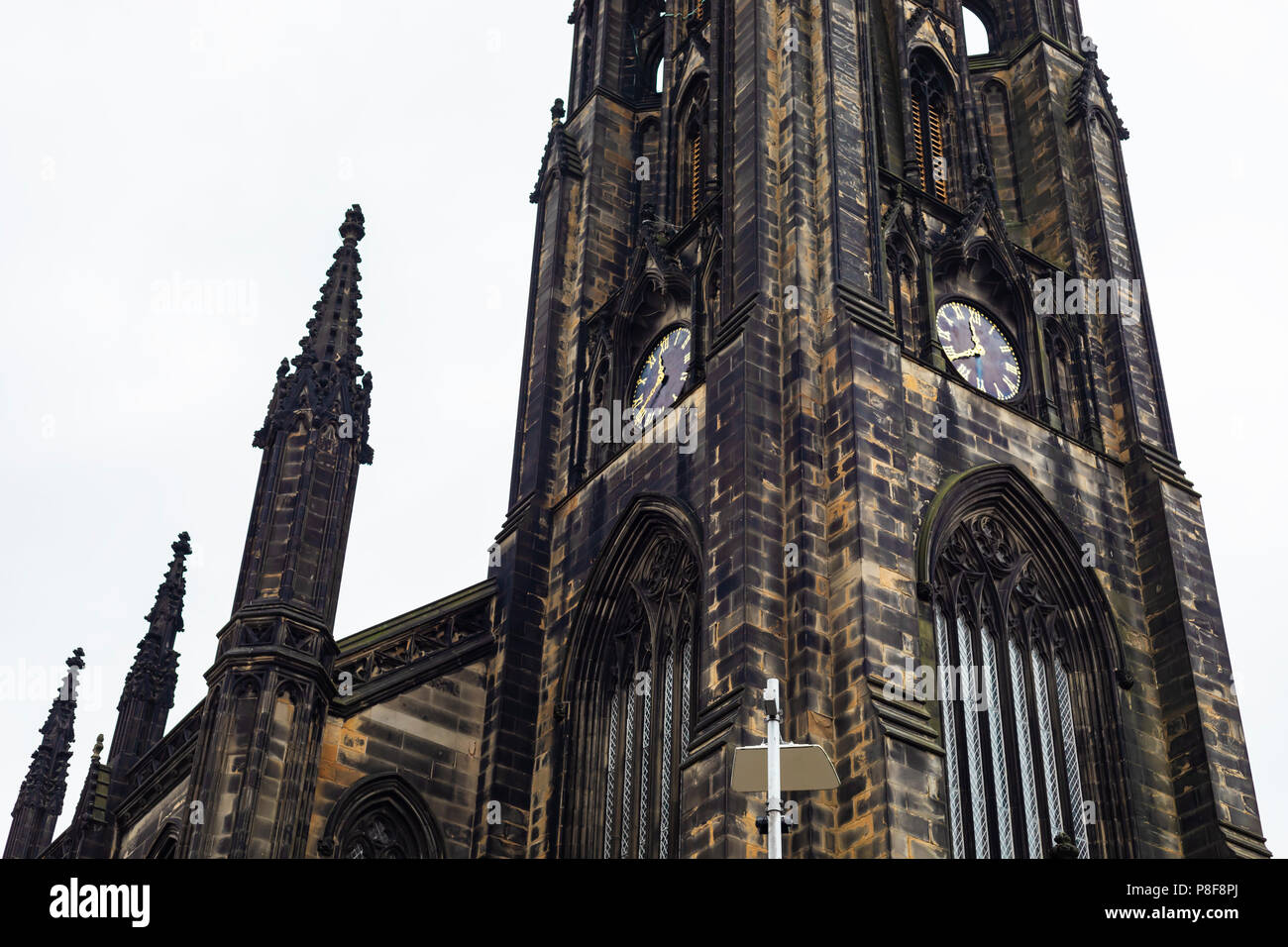 Edinburgh, United Kingdom - January 13, 2018: Close up of the clock tower of The Hub of Edinburgh in Scotland, United Kingdom. Stock Photo