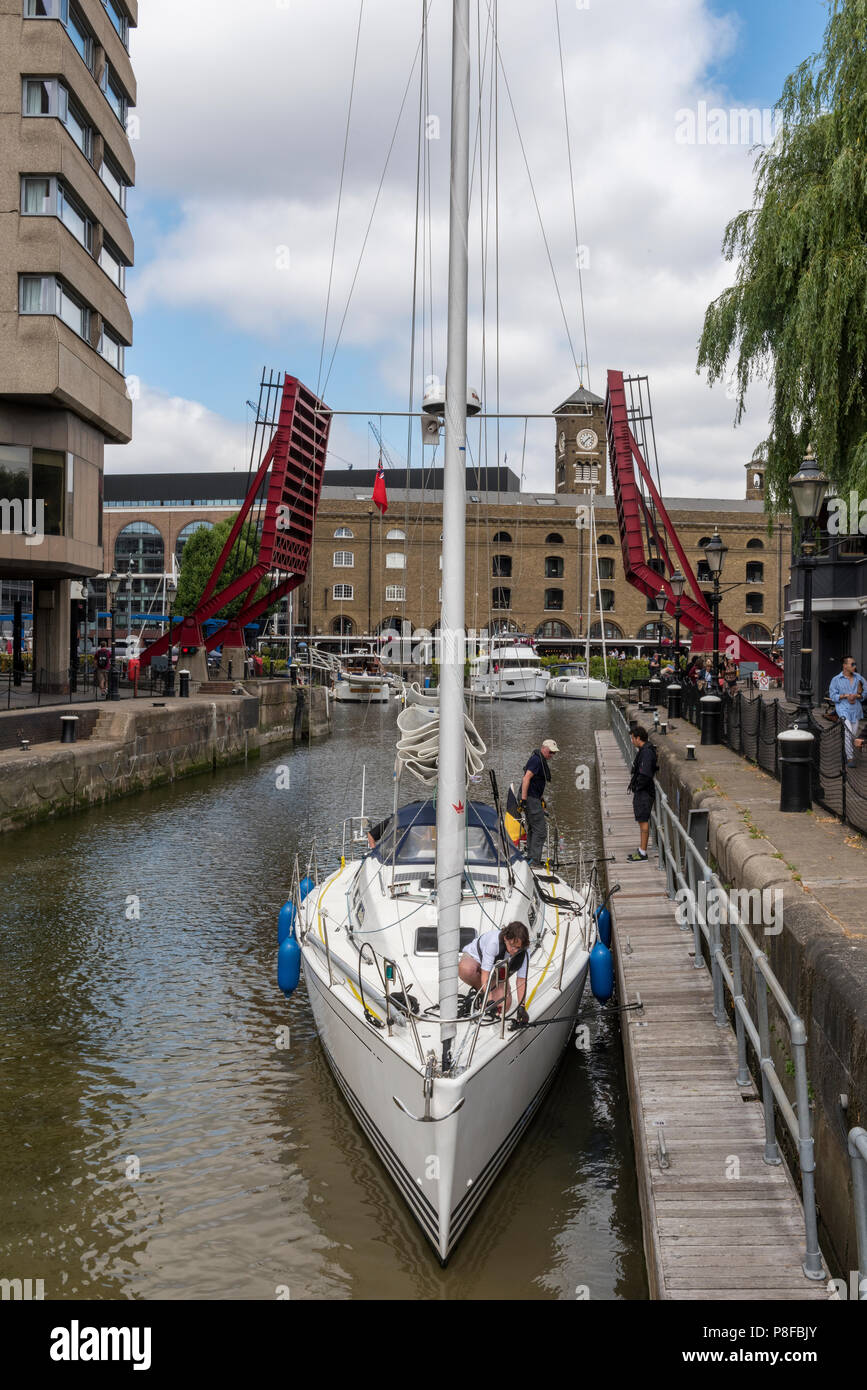 a large sailing yacht in the lock at st katherine docks in central london. Stock Photo