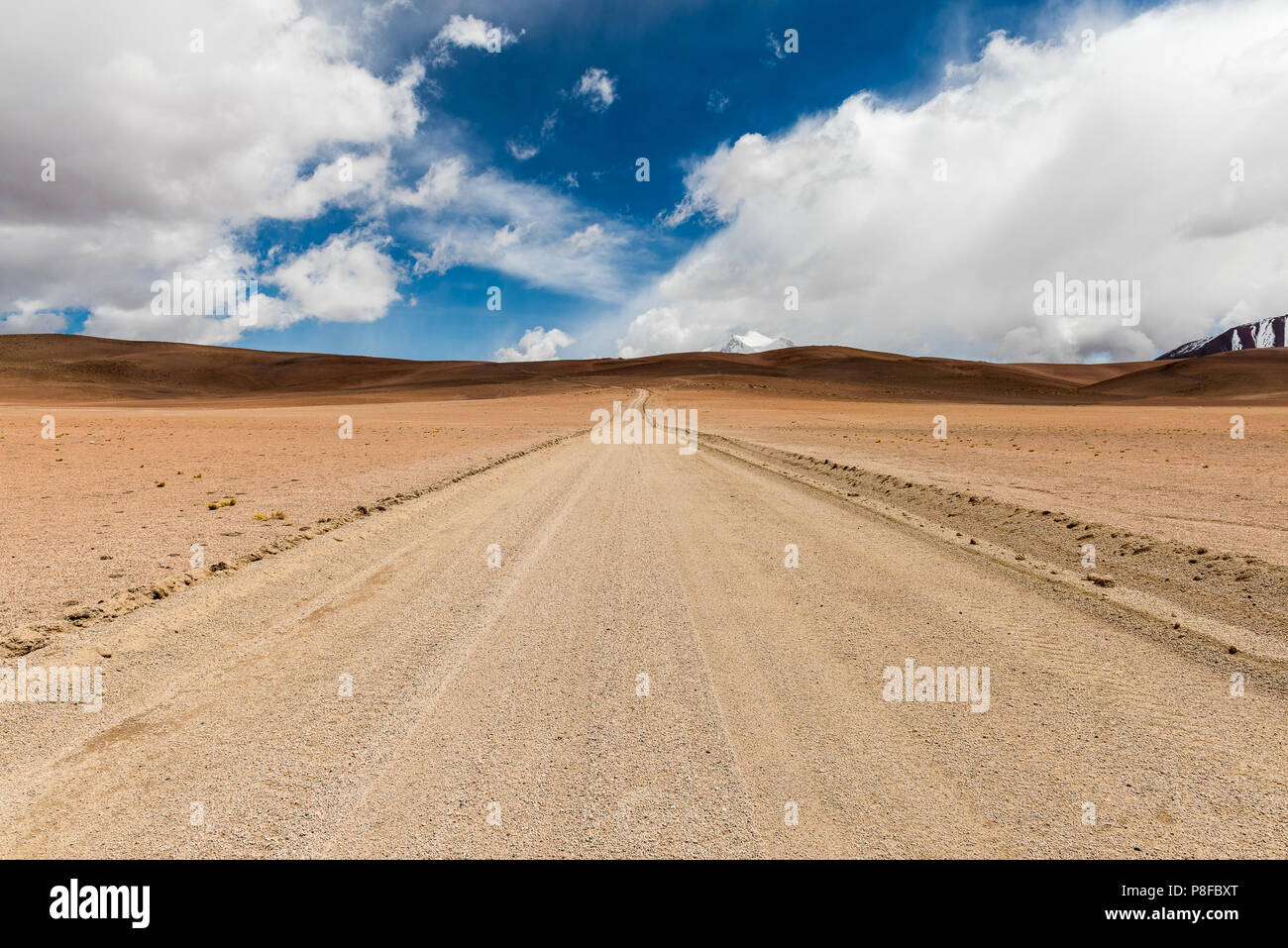 Desert road through the mountains, San Pedro de Atacama, Antofagasta, Chile Stock Photo