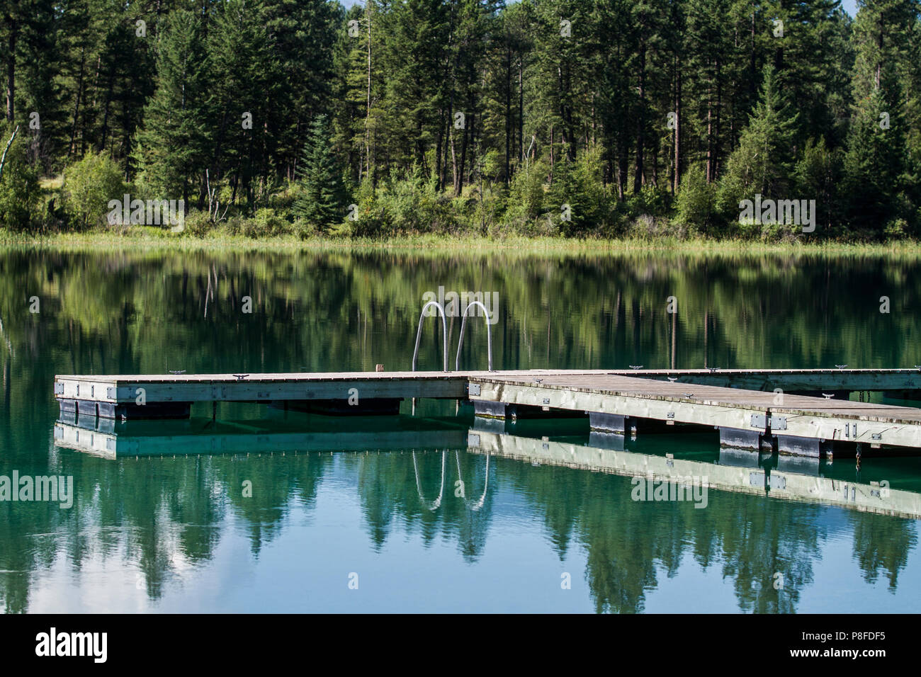 Beautiful lake dock diving platform hires stock photography and images
