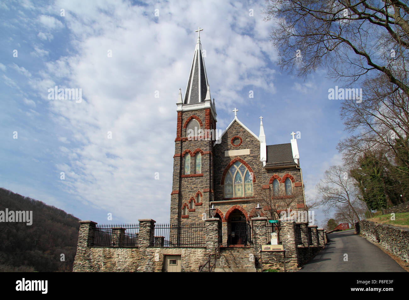 The steeple of St Peters Roman Catholic Church rises high above the ...