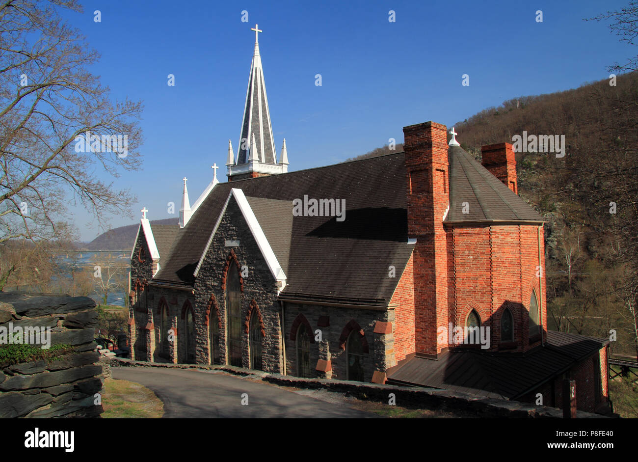 The steeple of St Peters Roman Catholic Church rises high above the ...