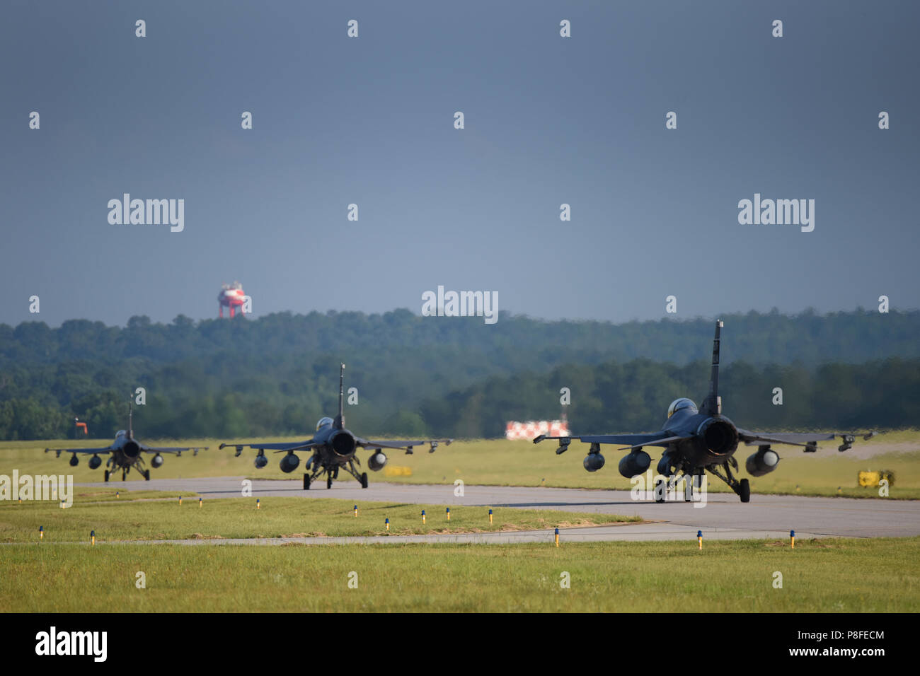 U.S. Air Force aircraft maintenance personnel and fighter pilots from the South Carolina Air National Guard's 169th Fighter Wing at McEntire Joint National Guard Base, South Carolina, perform preflight and launch operations to deploy F-16 Block 52 Fighting Falcon fighter jets for an AEF rotation to Southwest Asia, July 11, 2018. The South Carolina Air National Guard’s 169th Fighter Wing is deploying nearly 300 Airmen and approximately a dozen F-16 Block 52 Fighting Falcon fighter jets to the 407th Air Expeditionary Group in Southwest Asia in support of an Air Expeditionary Force rotation. (U.S Stock Photo