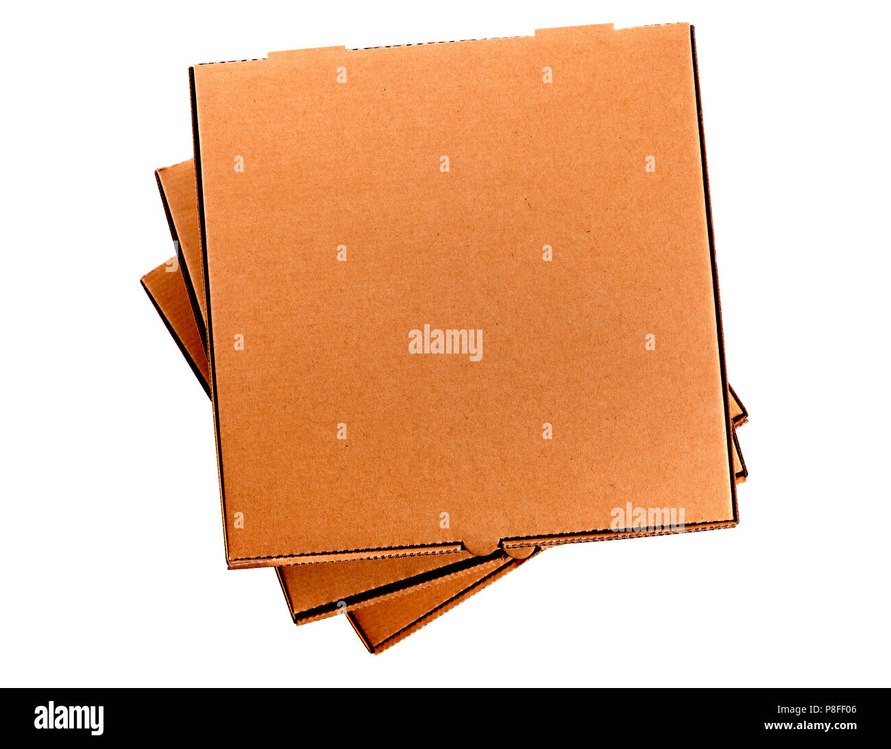 Stack of three plain brown pizza boxes isolated on white background. Top view, copy space. Stock Photo