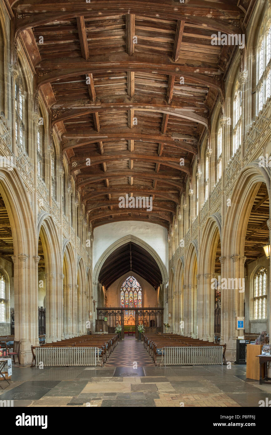 Interior of St. Peter and St. Paul church in Lavenham a Grade I listed parish church. The font and much of the church date from the 14th Century. Stock Photo