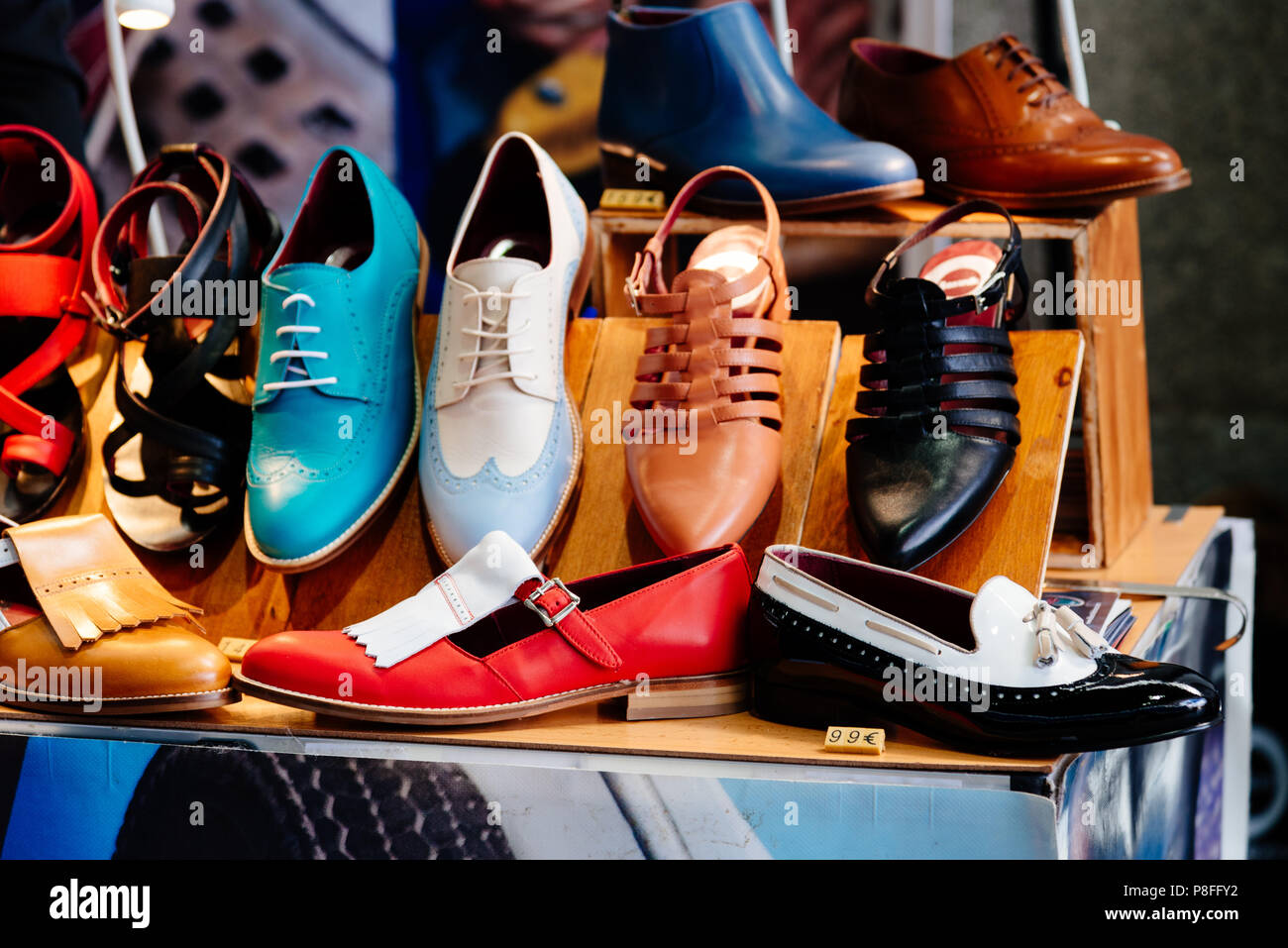 Close up of retro shoes for sale in market stall Stock Photo Alamy