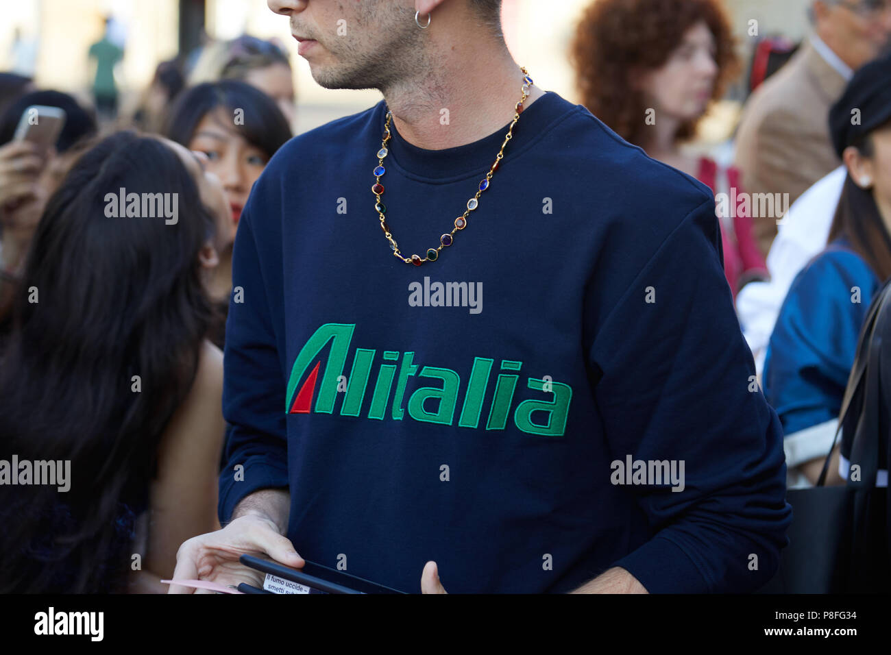voldgrav berømt Hændelse MILAN - JUNE 15: Man with Alitalia sweater before Alberta Ferretti fashion  show, Milan Fashion Week street style on June 15, 2018 in Milan Stock Photo  - Alamy