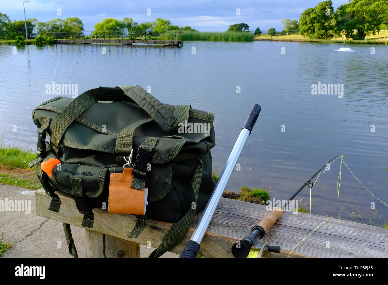 Fly fishing tackle by a fishery, Penmaenmawr, North Wales UK Stock Photo