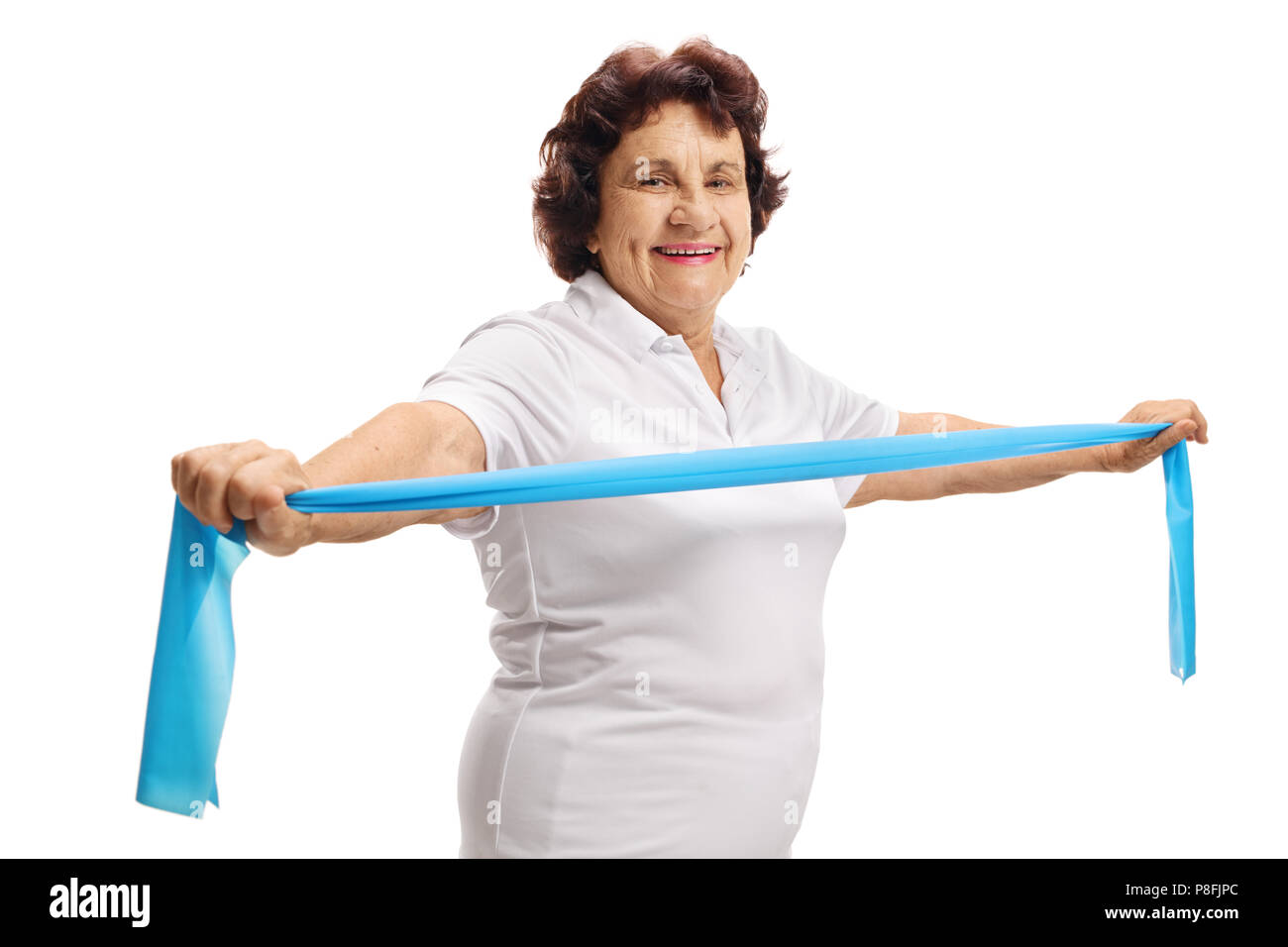 Senior lady exercising with a rubber band isolated on white background Stock Photo