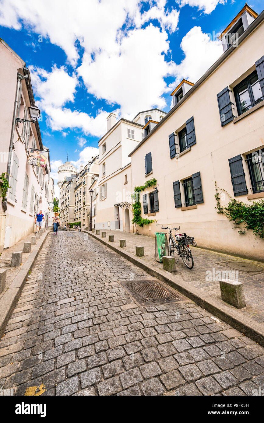Charming cobblestone street in Montmartre, Paris
