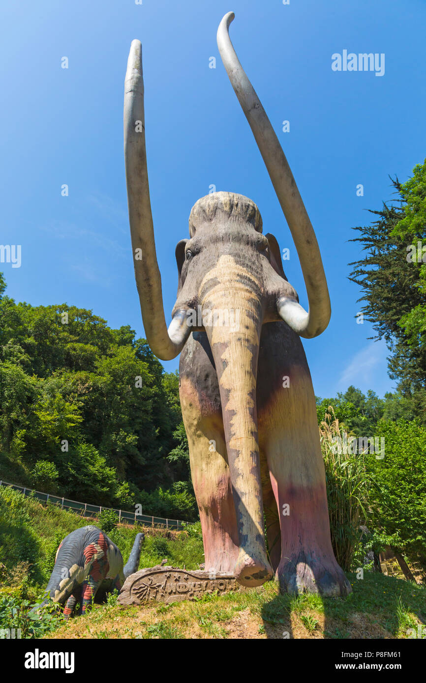 Dinosaurs in the Prehistoric Dinosaur Valley at Wookey Hole, Wells, Somerset, UK in July Stock Photo