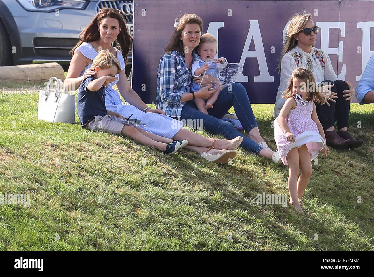 Catherine, Duchess of Cambridge, accompanied by Prince George and Princess Charlotte, attends the Maserati Polo match at Beaufort Polo Club in Gloucestershire  Featuring: Catherine Duchess of Cambridge, Catherine Middleton, Kate Middleton, Prince George, Princess Charlotte Where: Tetbury, United Kingdom When: 10 Jun 2018 Credit: John Rainford/WENN Stock Photo