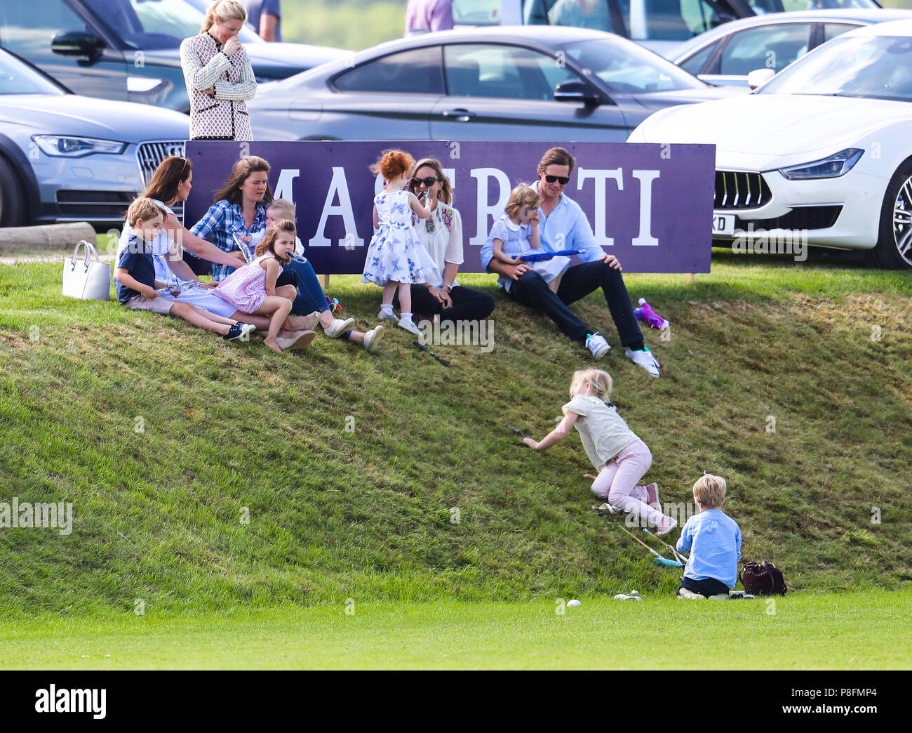 Catherine, Duchess of Cambridge, accompanied by Prince George and ...
