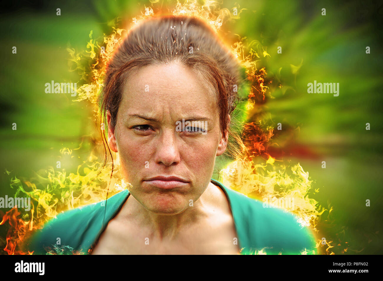 Very angry woman on fire Stock Photo