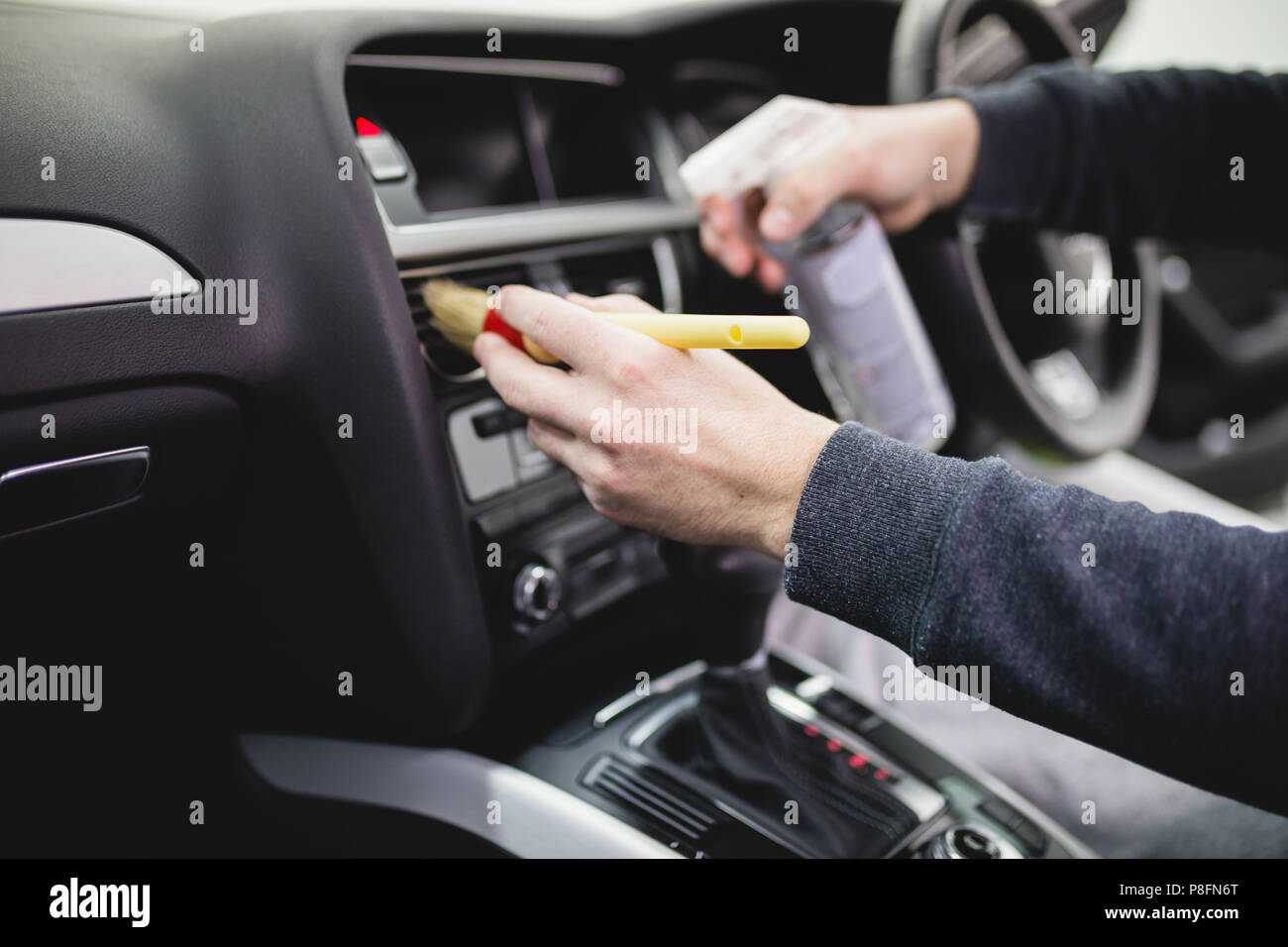 A Man Cleaning Car Interior Car Detailing Or Valeting