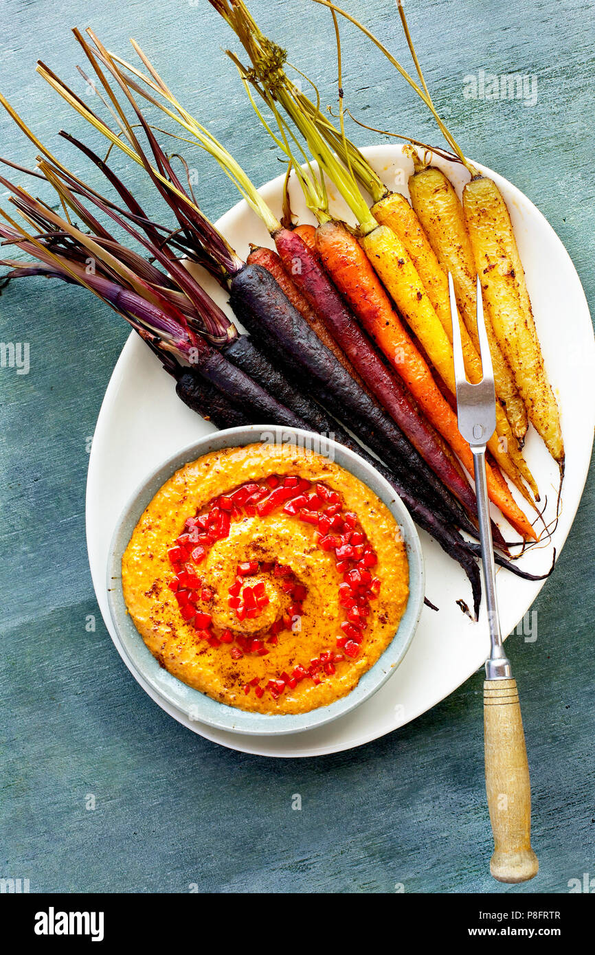 Sumac Roasted Carrots with Roasted Red Pepper Harissa Pesto