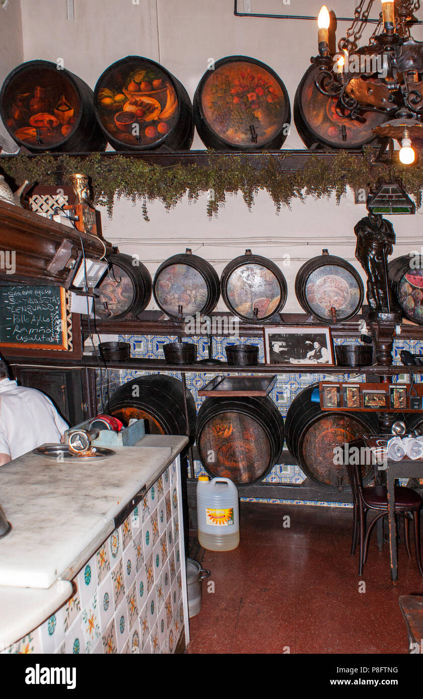 Traditional painted old wine casks in a Tapas bar in Barcelona spain Stock Photo
