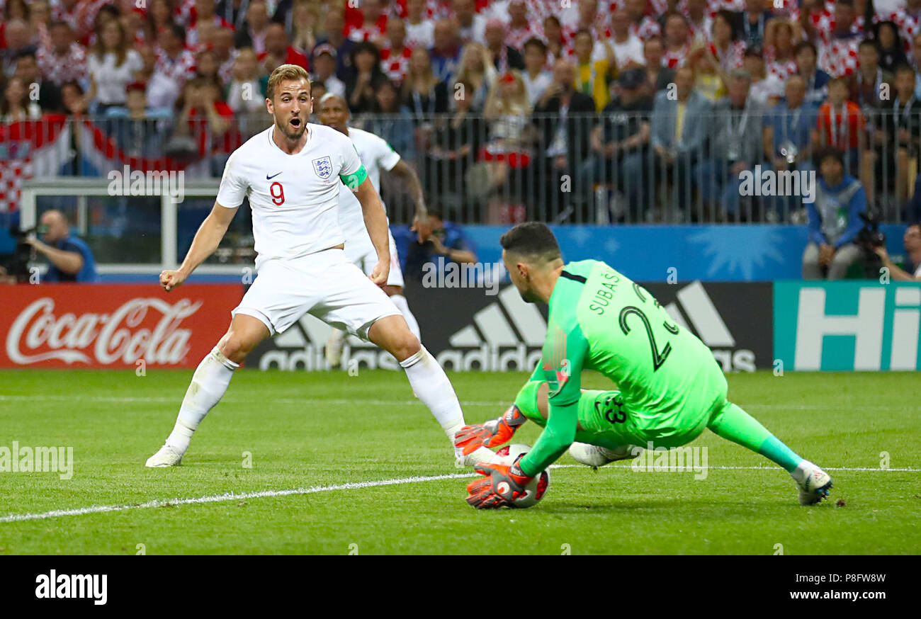 England's Harry Kane has an attempt on goal saved by Croatia goalkeeper Danijel Subasic during the FIFA World Cup, Semi Final match at the Luzhniki Stadium, Moscow. Stock Photo