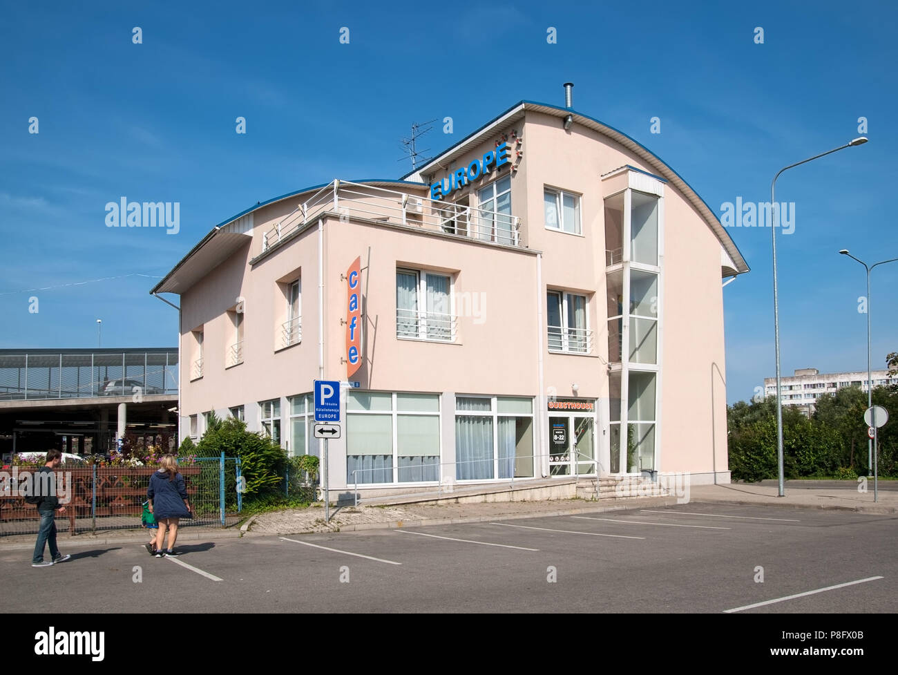NARVA, ESTONIA - AUGUST 21, 2016: People near Europe Guest House. Located in a new city not far from Astri Keskus Center Stock Photo