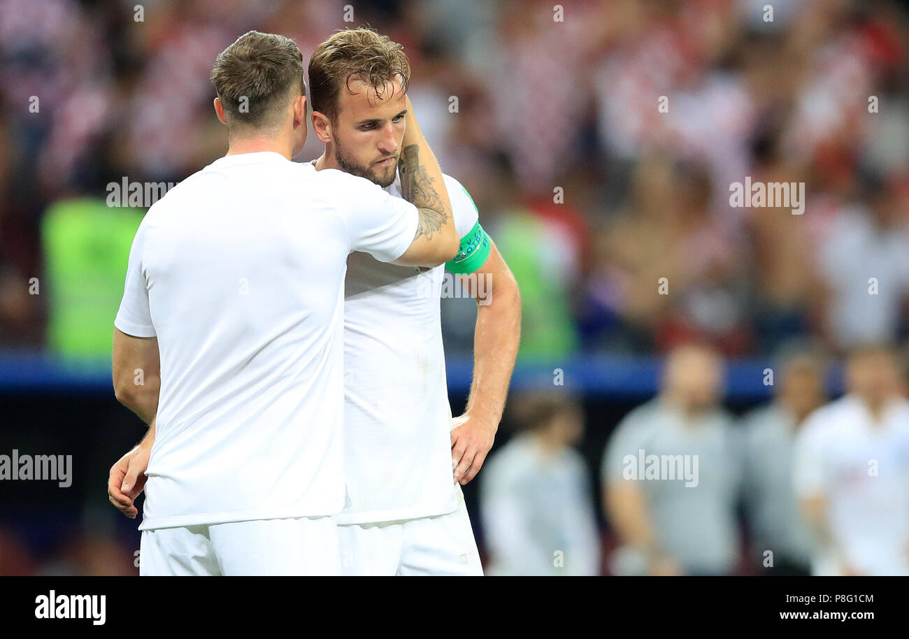 England's Harry Kane (right) and Phil Jones after the FIFA World Cup, Semi Final match at the Luzhniki Stadium, Moscow. Stock Photo