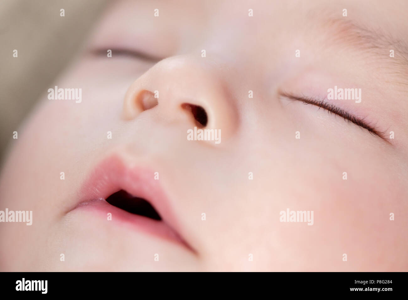 close up of sleeping asian baby boy face Stock Photo