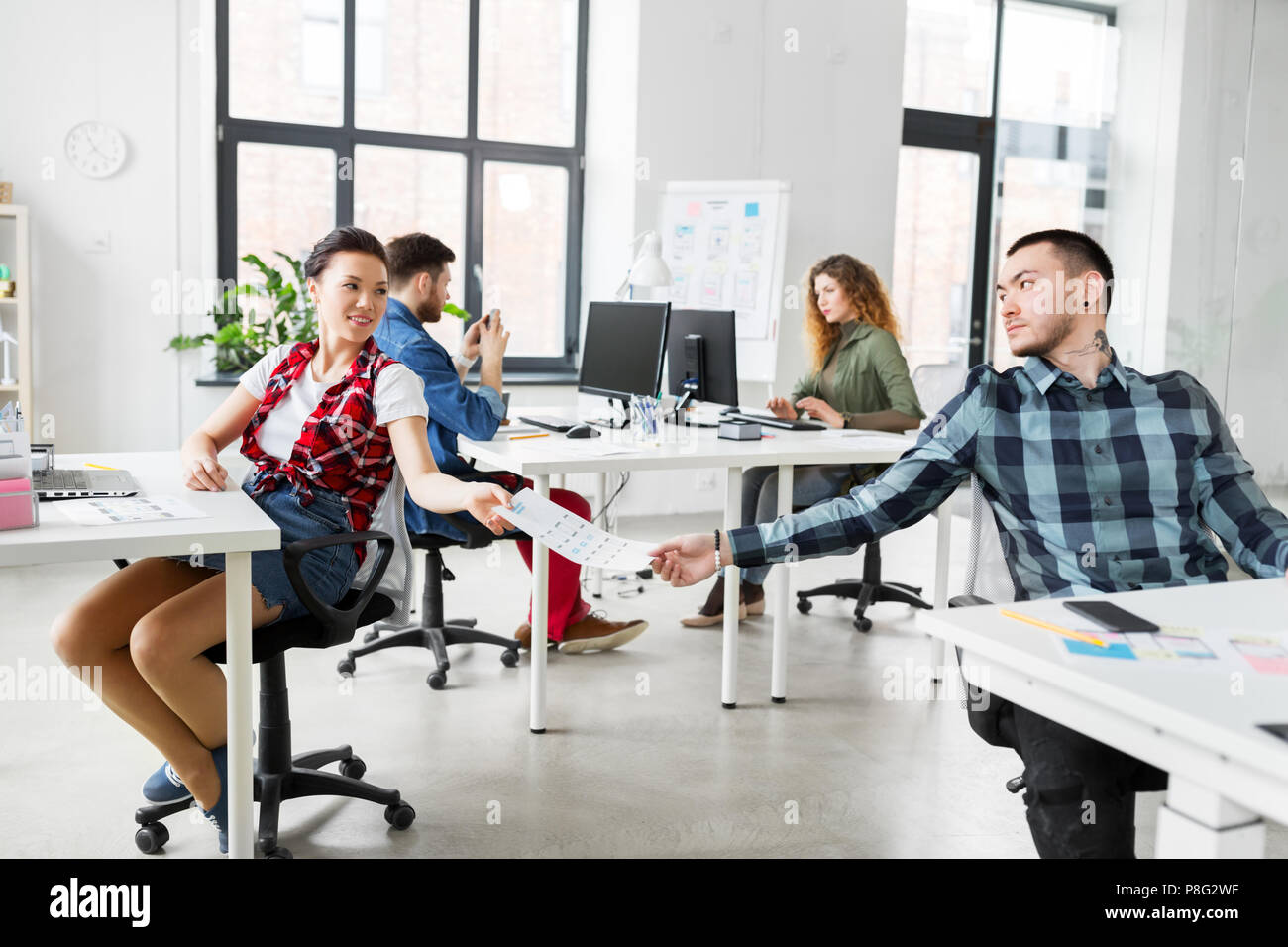 creative office workers with user interface mockup Stock Photo
