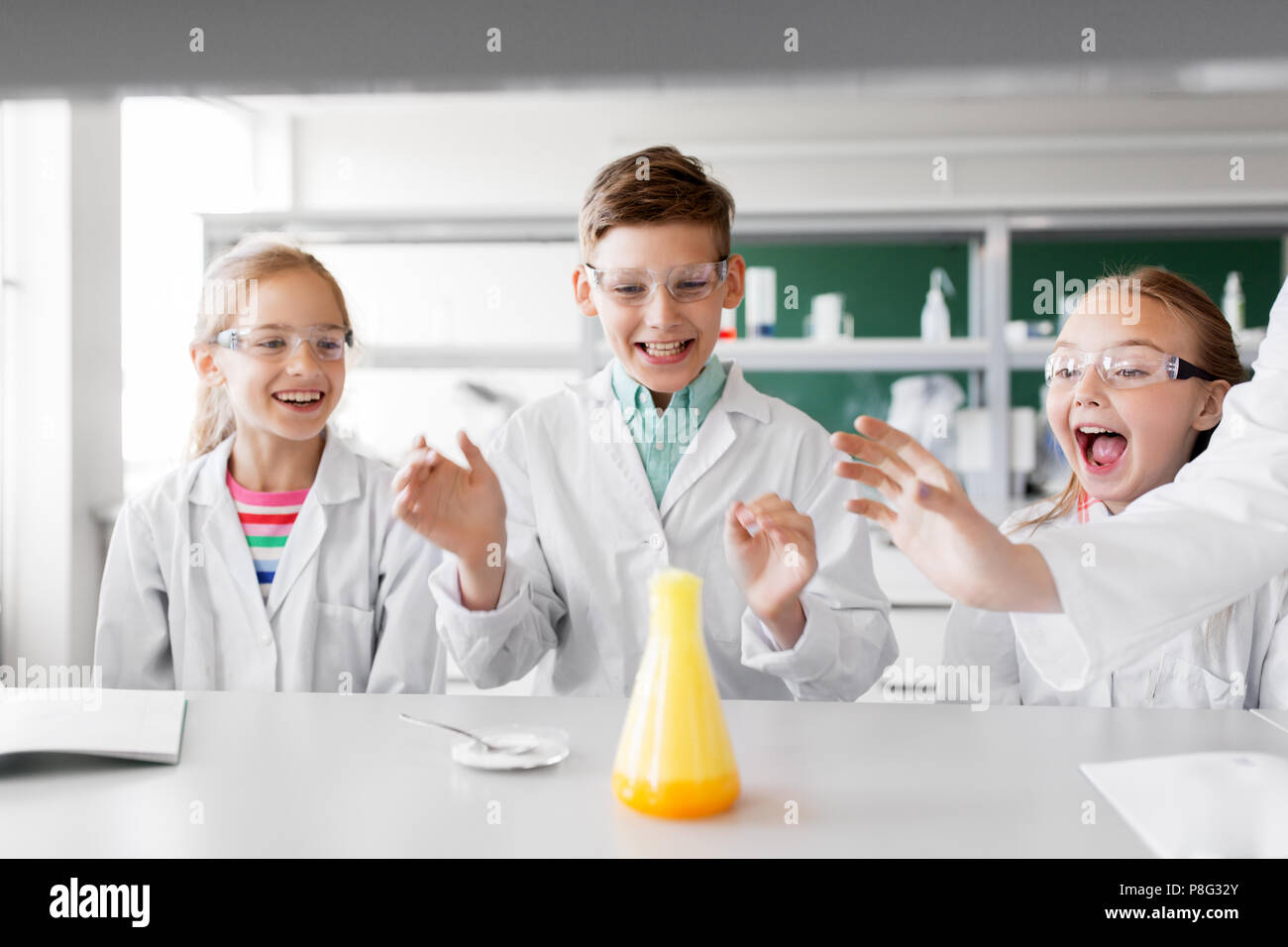 kids with test tube studying chemistry at school Stock Photo - Alamy