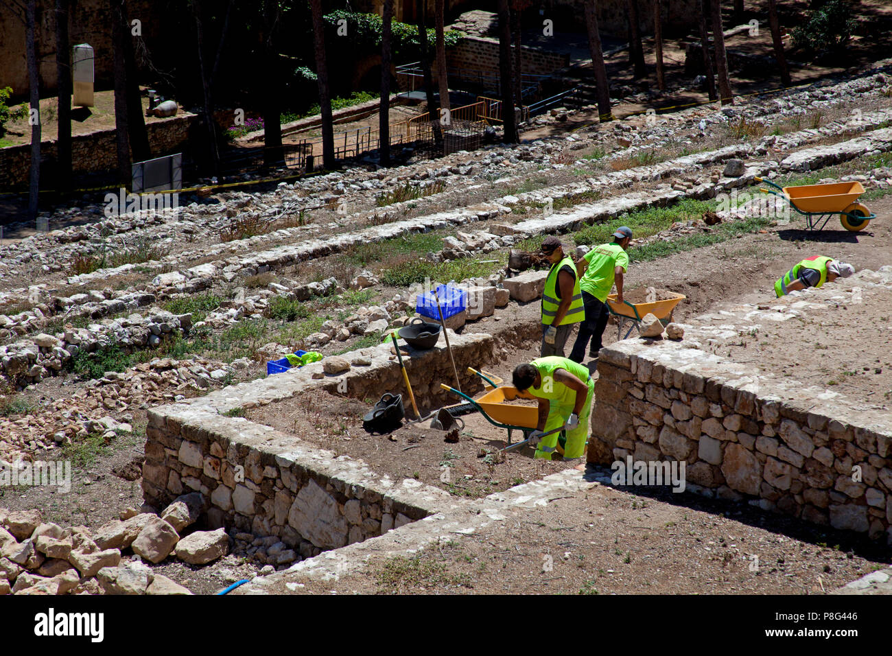 Dénia, castle Archaeological ruins, people working on discovering Roman artifacts Stock Photo